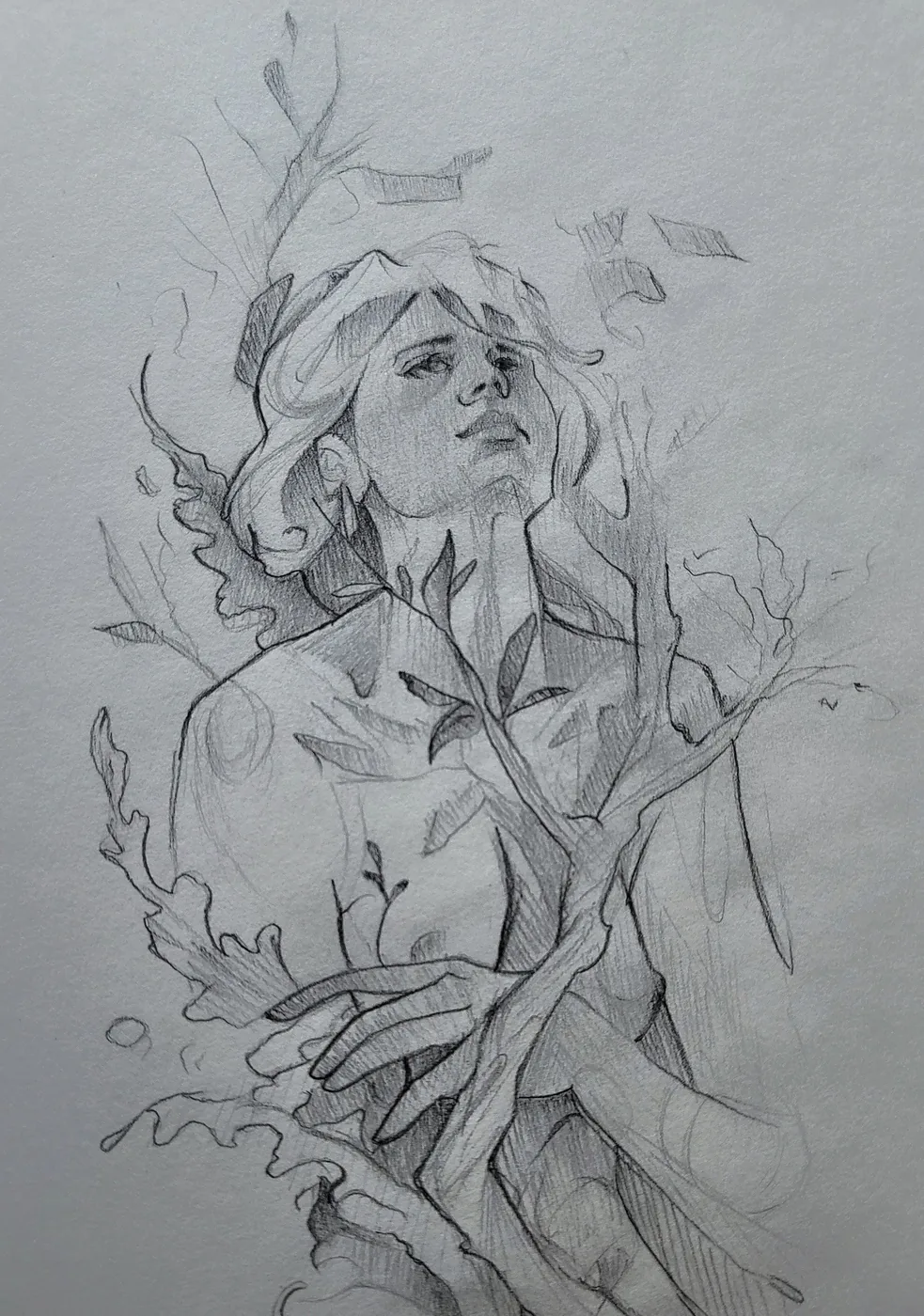 Pencil portrait of a woman turning upward, her figure breaking into branches and leaves.
