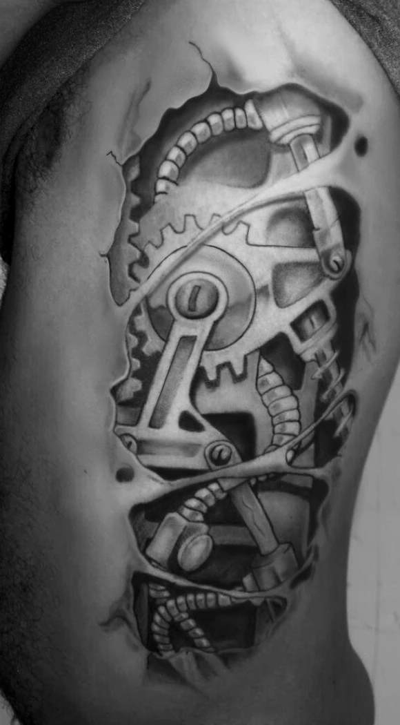 Black-and-grey biomechanical tattoo: torn skin over gears, pistons and cabling, along the ribs.
